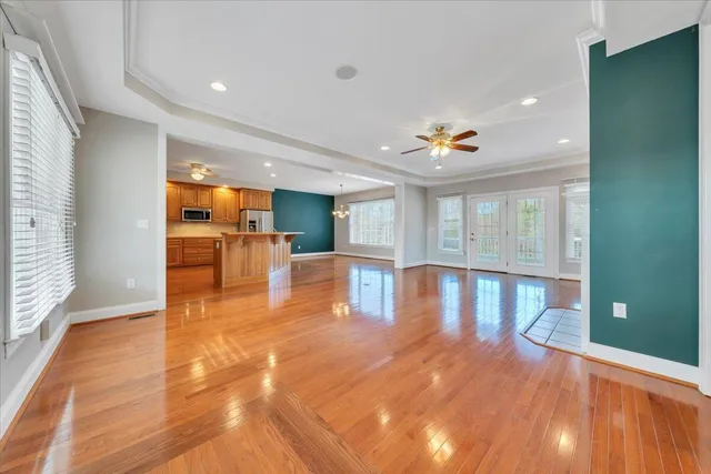 a kitchen with stainless steel appliances granite countertop a sink and cabinets