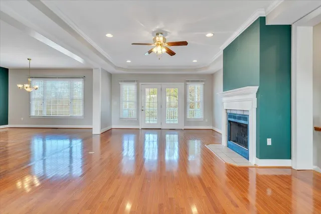 a view of room with wooden floor
