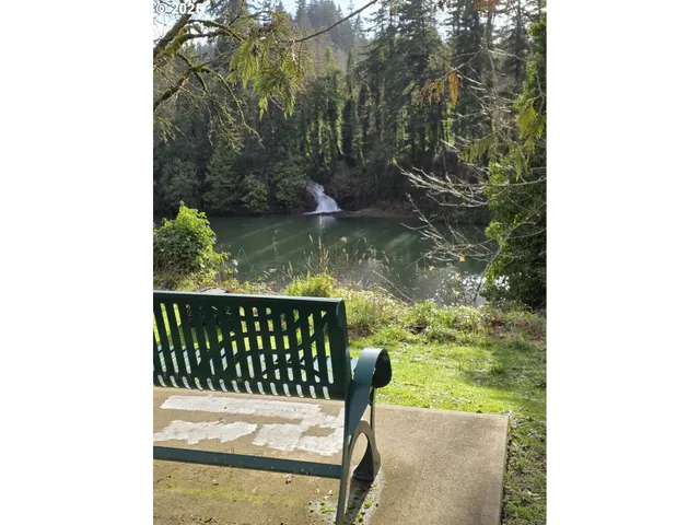 a balcony with trees in front of it