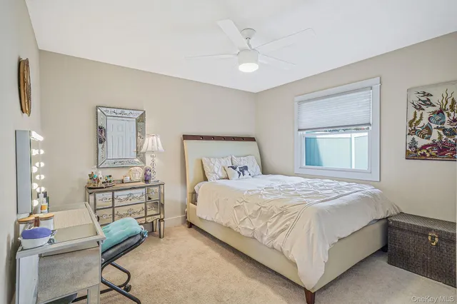 a bedroom with a bed and furniture