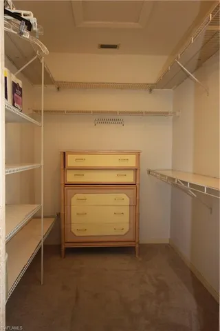 a utility room with closet