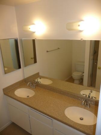 7560 Cathedral Oaks Road Goleta, CA 93117 - Photo 4 of 6 a bathroom with a sink and a mirror