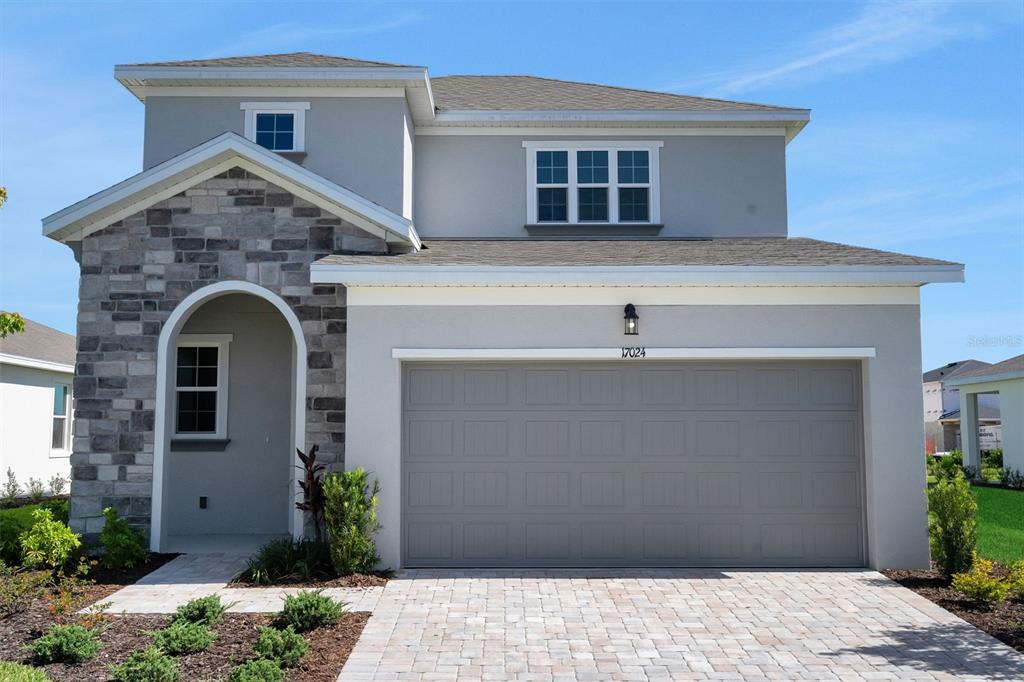 17024 Cottontail Circle Punta Gorda, FL 33982 - Photo 2 of 43 a front view of a house with a yard