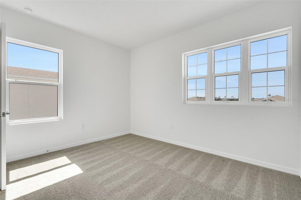 17024 Cottontail Circle Punta Gorda, FL 33982 - Photo 34 of 43 a view of an empty room with a window