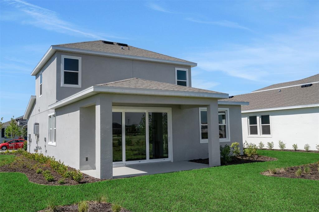 17024 Cottontail Circle Punta Gorda, FL 33982 - Photo 6 of 43 a front view of a house with a yard