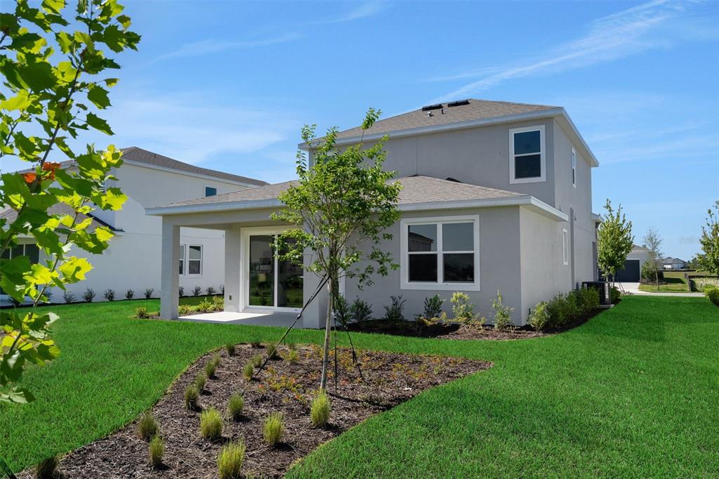 17024 Cottontail Circle Punta Gorda, FL 33982 - Photo 7 of 43 a front view of a house with garden