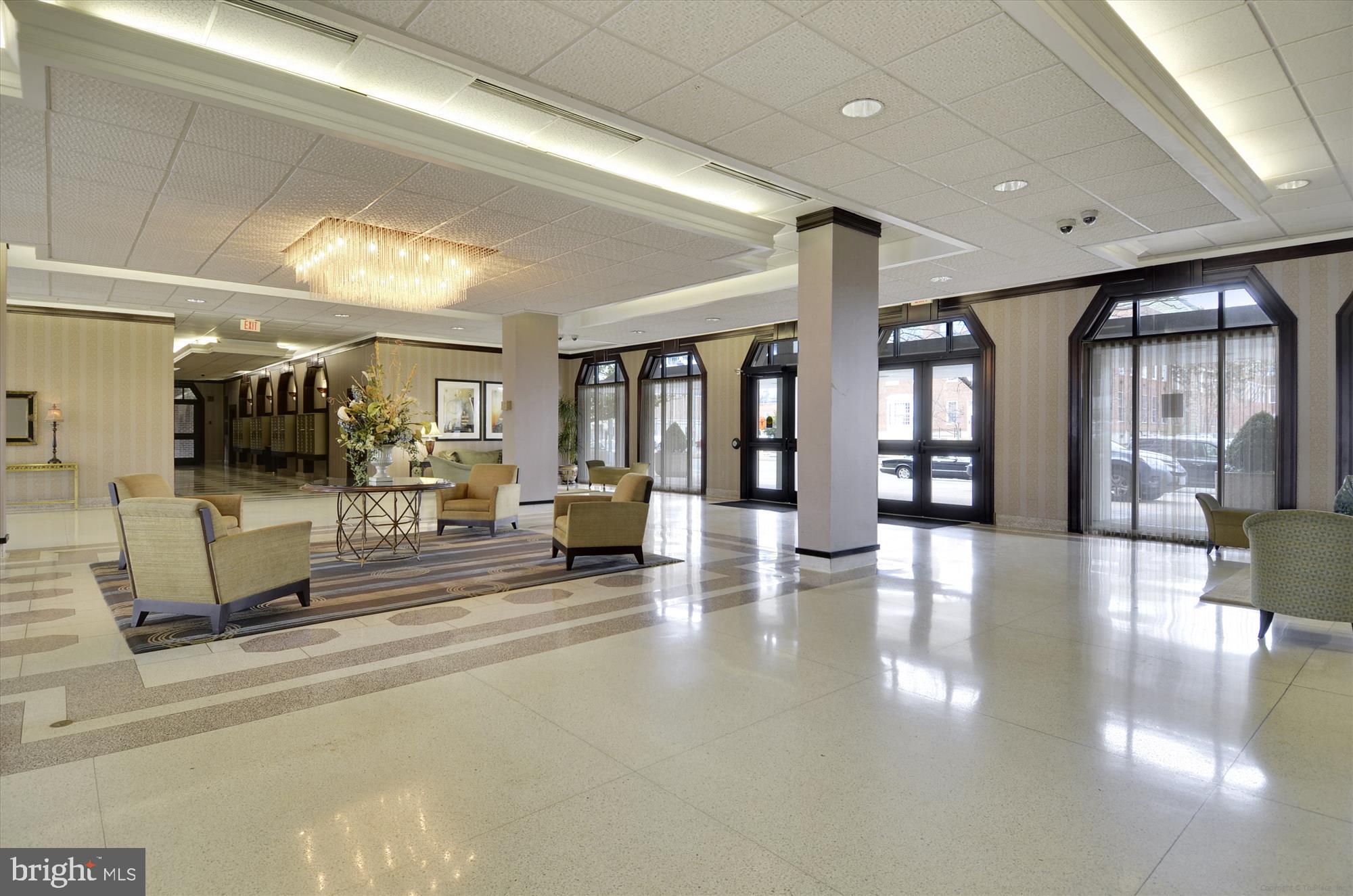 700 7th Street Southwest, Unit 701 Washington, DC 20024 - Photo 29 of 54 Elegant Lobby w/ 24 front desk