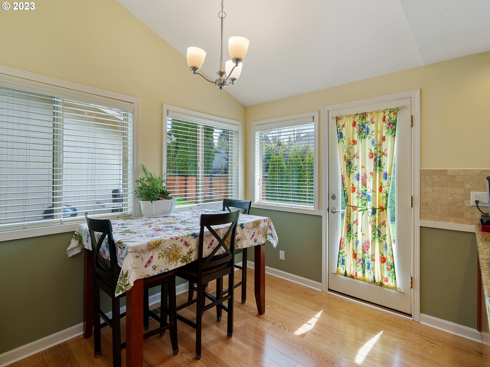 992 Spyglass Drive Eugene, OR 97401 - Photo 12 of 35 a view of a dining room with furniture window and outside view