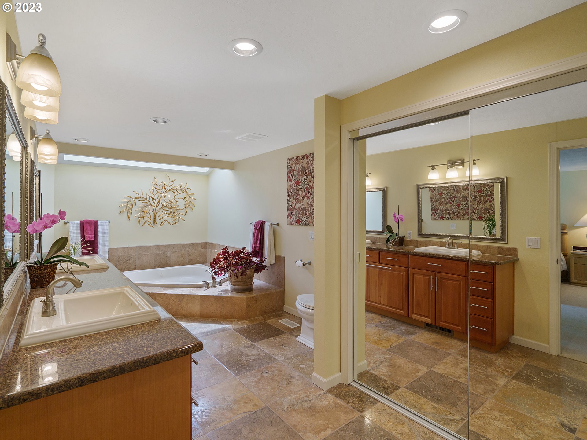 992 Spyglass Drive Eugene, OR 97401 - Photo 23 of 35 a kitchen with sink refrigerator and cabinets