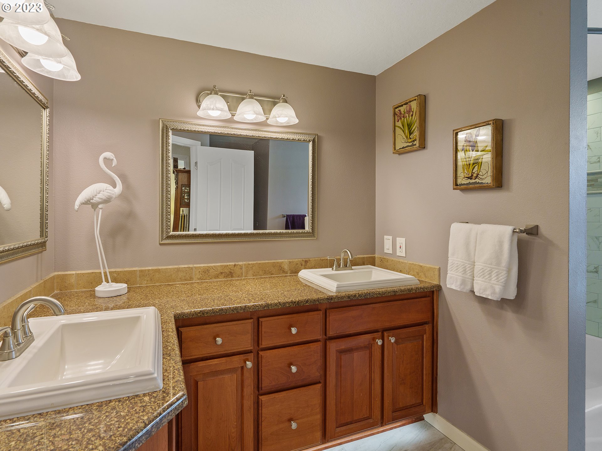 992 Spyglass Drive Eugene, OR 97401 - Photo 30 of 35 a bathroom with a sink and a mirror