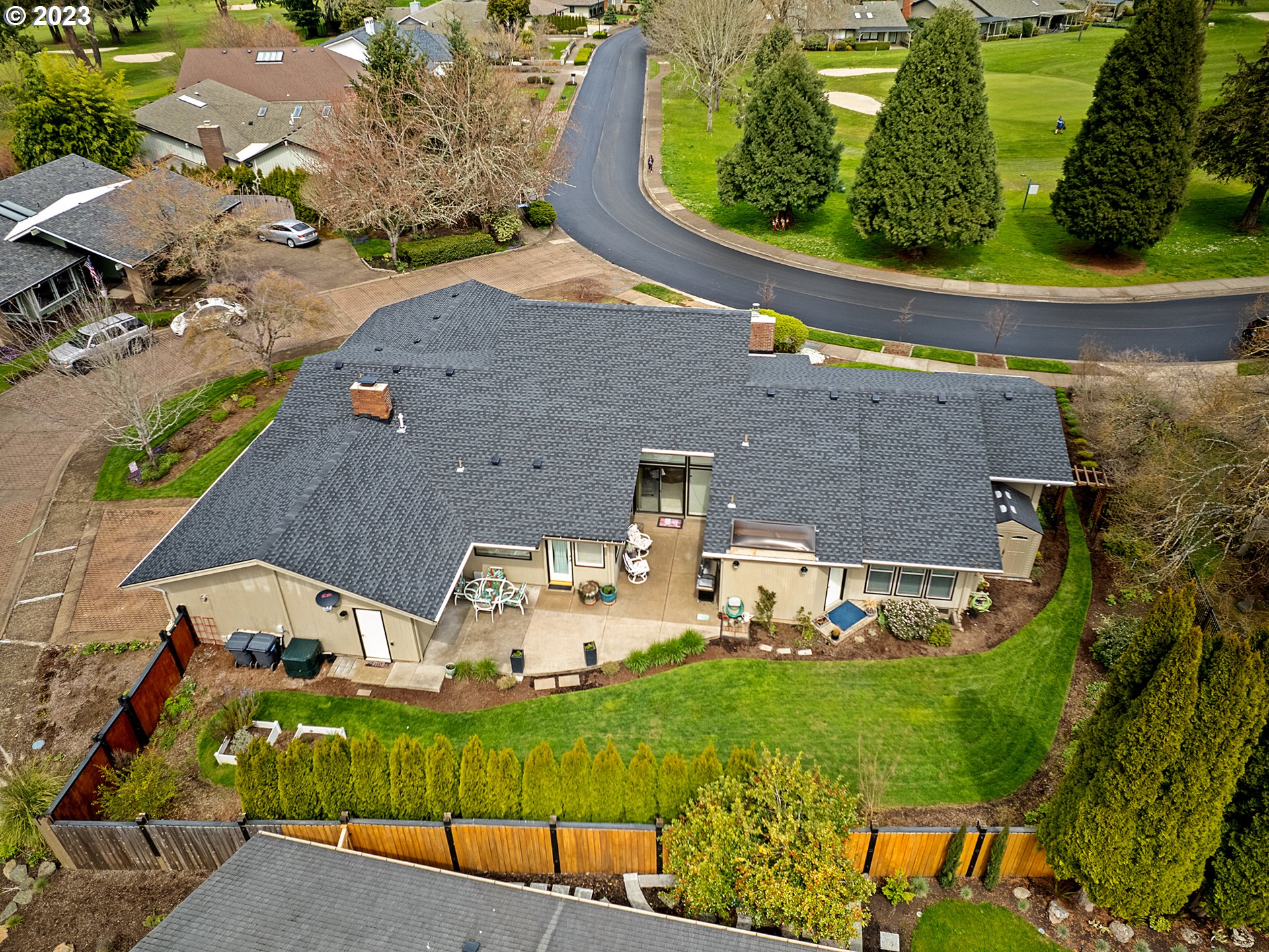 992 Spyglass Drive Eugene, OR 97401 - Photo 33 of 35 an aerial view of a house with a garden and a yard