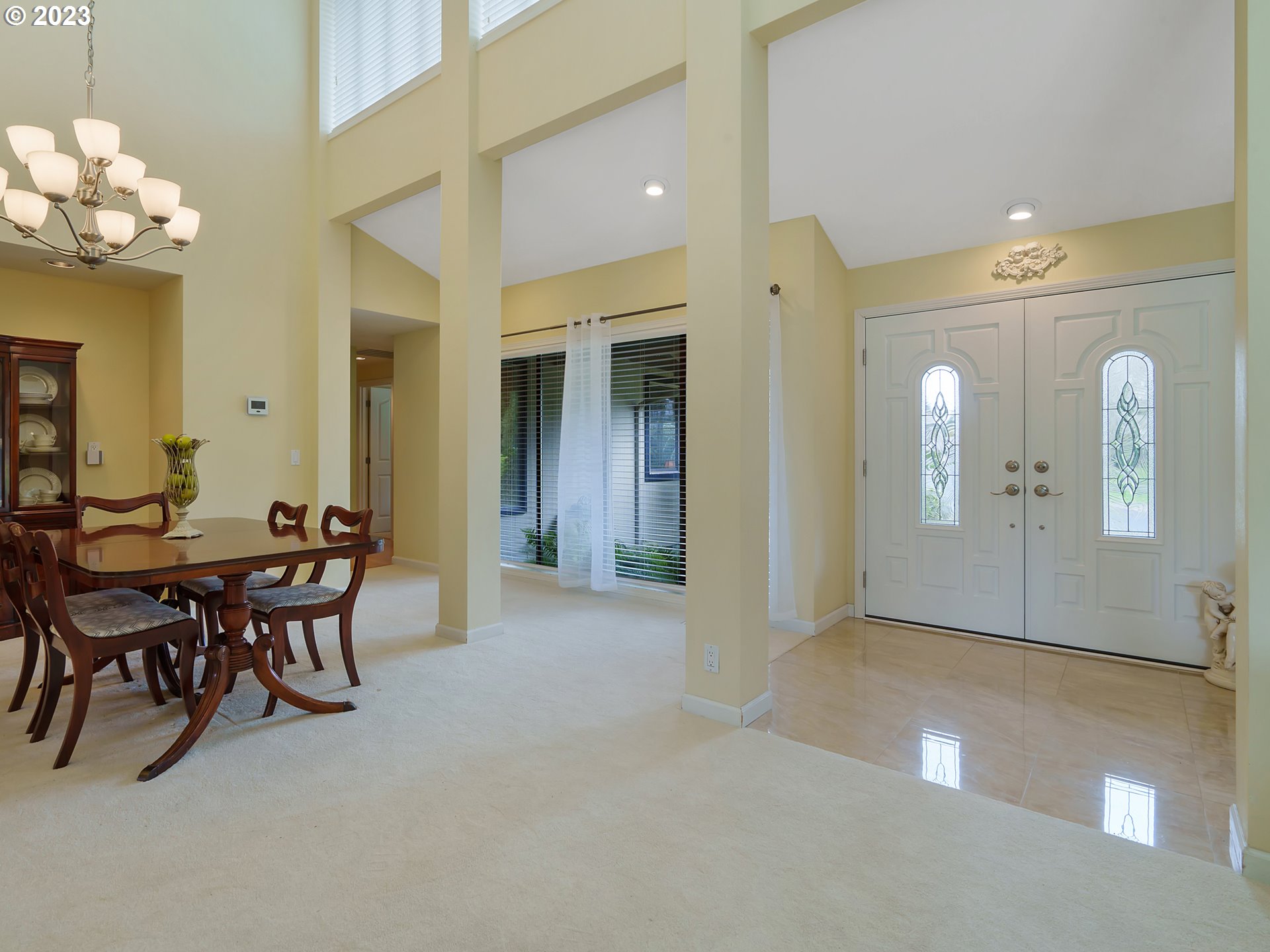 992 Spyglass Drive Eugene, OR 97401 - Photo 4 of 35 a view of a dining room with furniture and chandelier