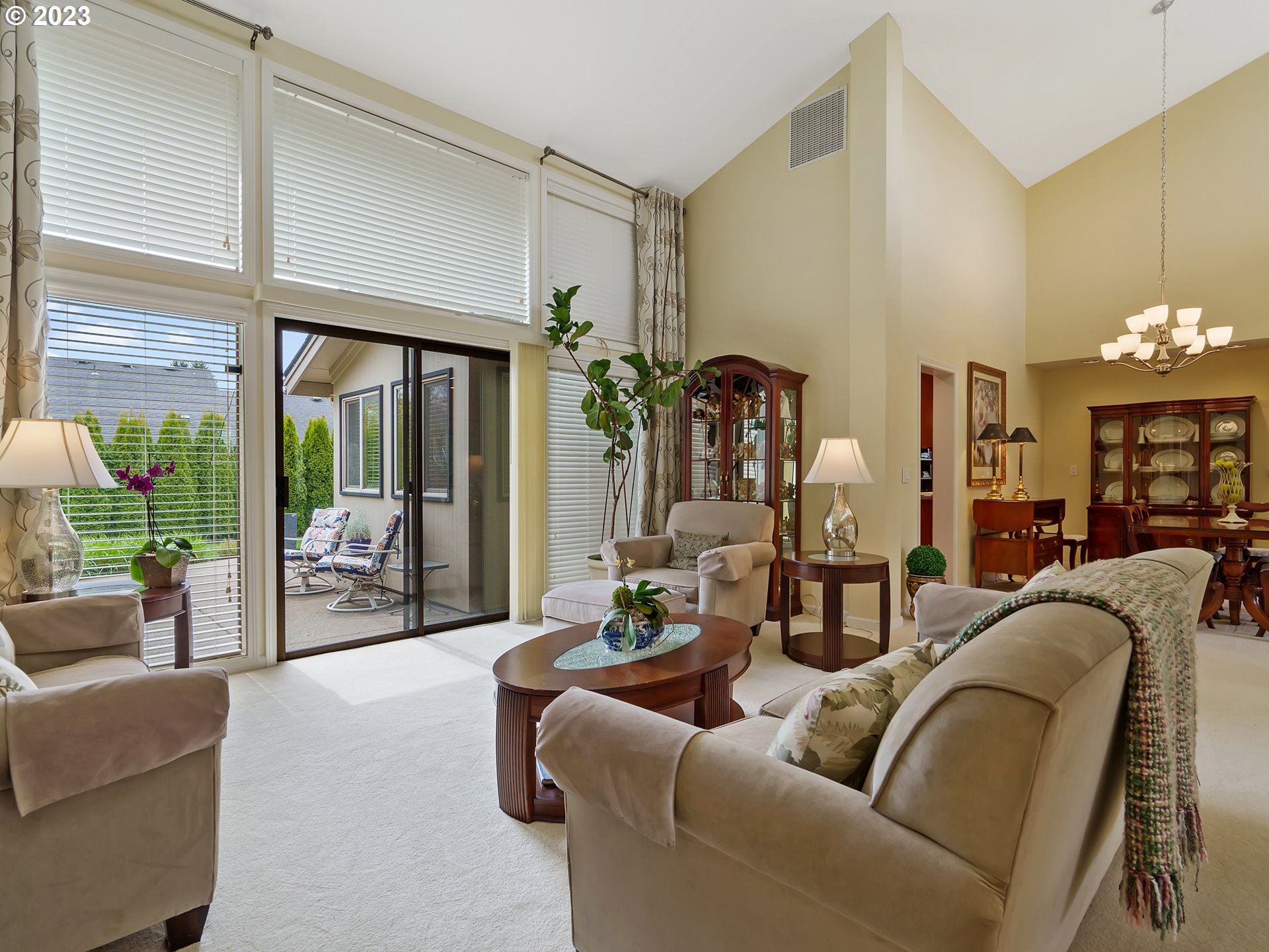 992 Spyglass Drive Eugene, OR 97401 - Photo 5 of 35 a living room with furniture and a large window