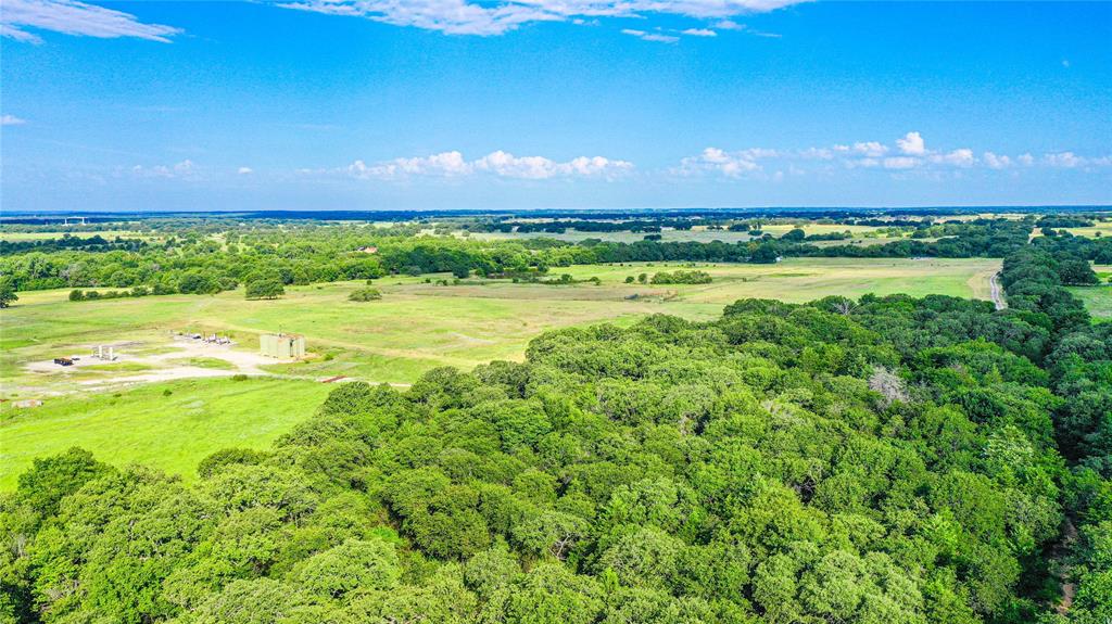 2215 Denver Road Sunset, TX 76270 - Photo 28 of 36 a view of an ocean and a yard