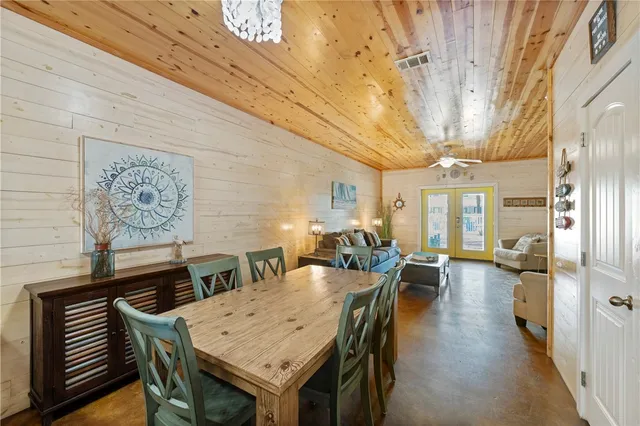 a kitchen with stove and cabinets