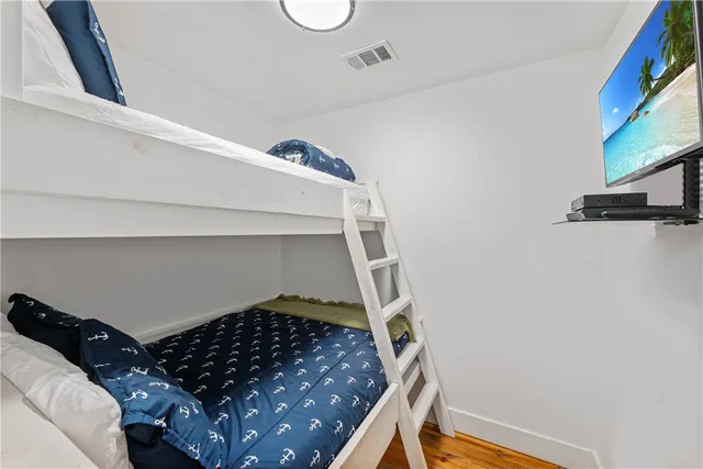 a close view of a utility room with dryer and washer