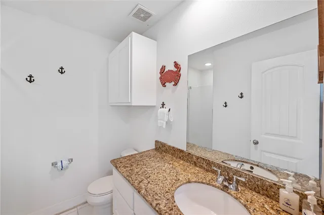 a view of swimming pool with outdoor seating