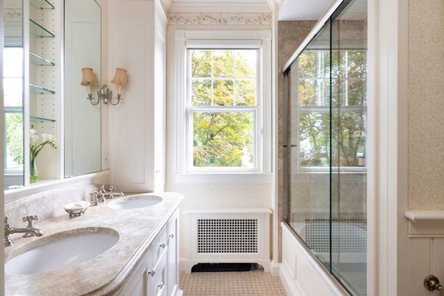 a reading room with furniture wooden floor and book shelf