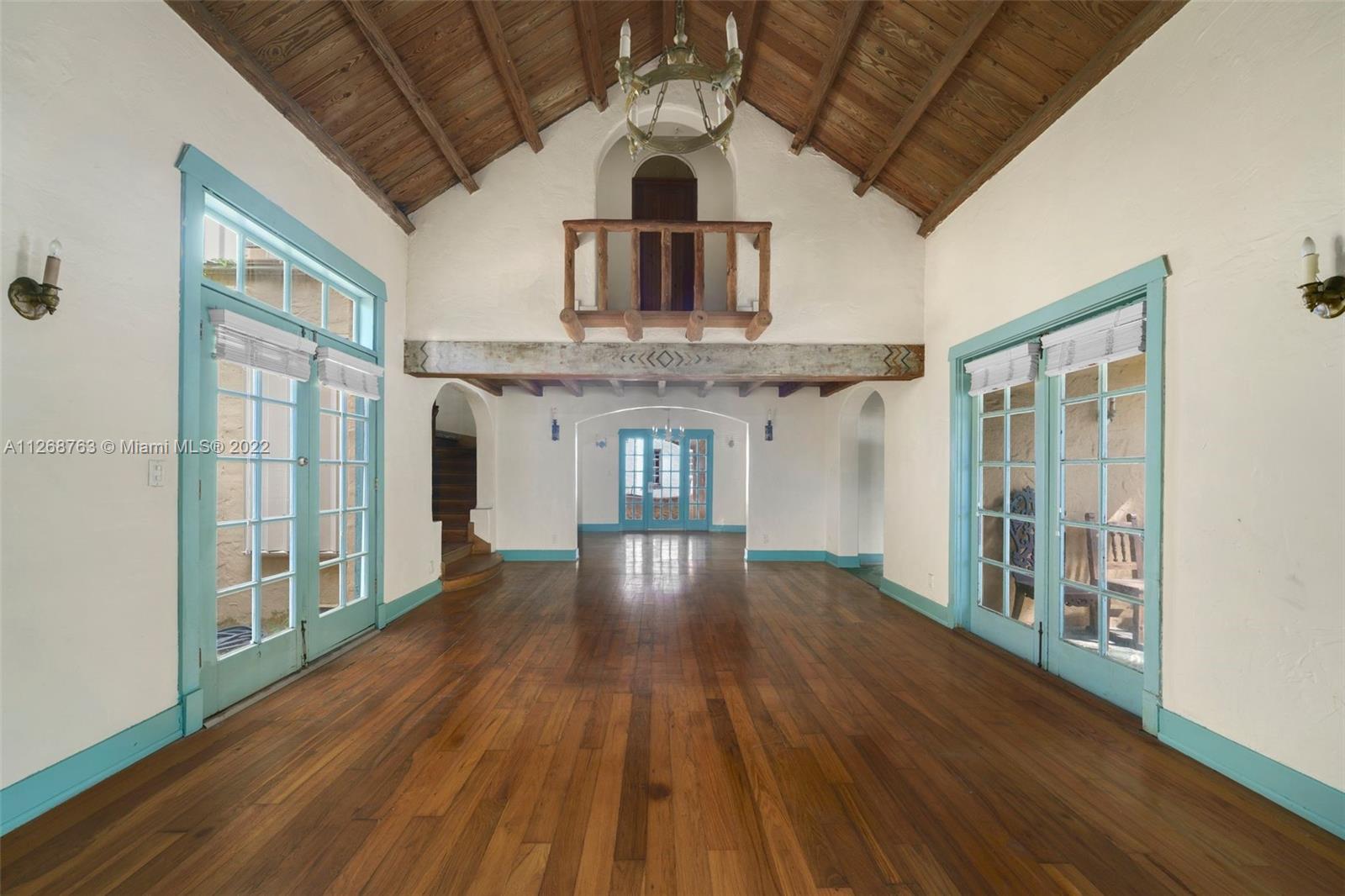 a view of gallery with wooden floor