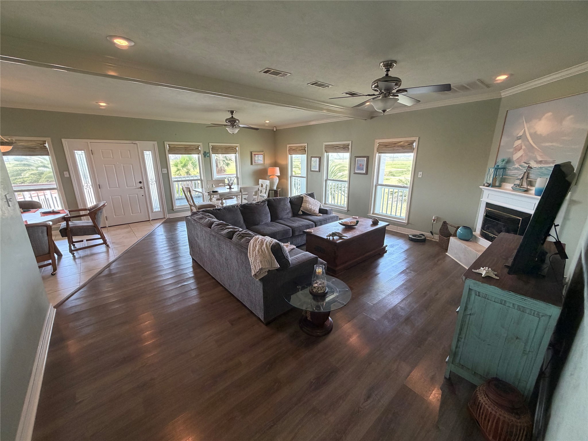 979 Rancho Carribe Drive Crystal Beach, TX 77650 - Photo 23 of 50 View from hallway into living room room and dining room room