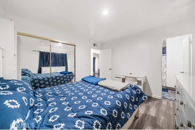 a bed room with a bed and a couch