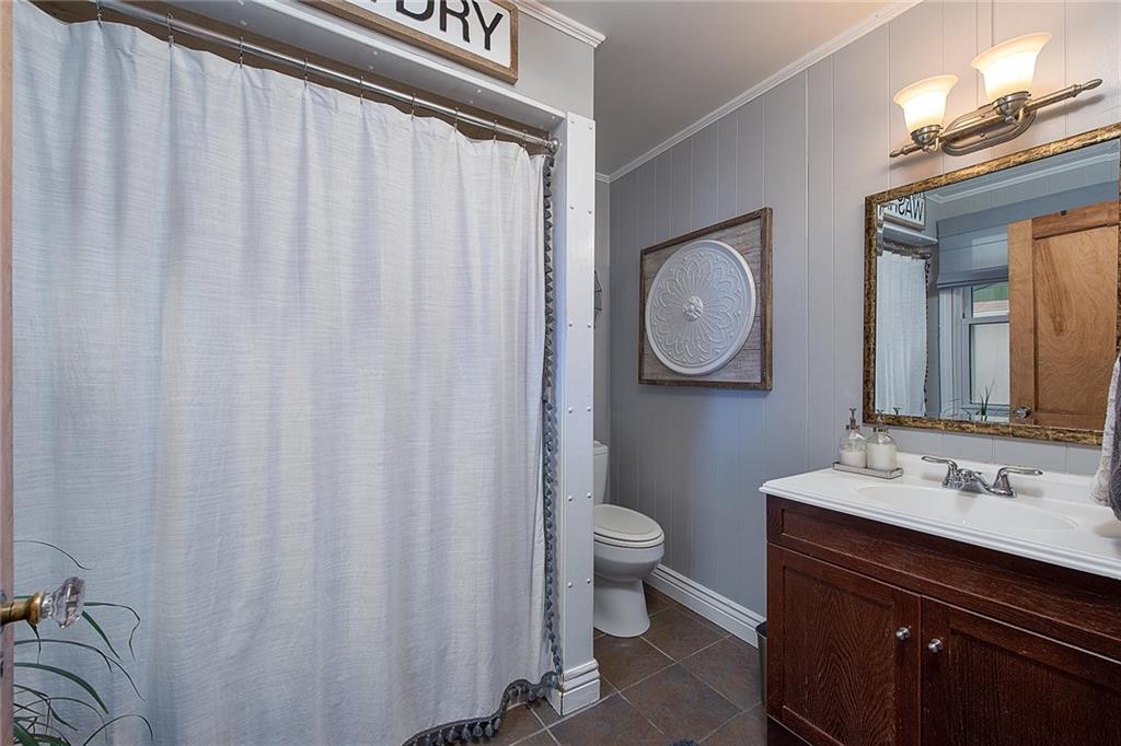 608 Blackburn Road Sewickley, PA 15143 - Photo 14 of 24 Updated first floor full bathroom adds convenience.