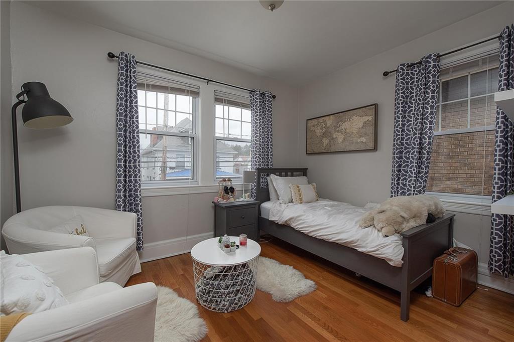608 Blackburn Road Sewickley, PA 15143 - Photo 15 of 24 Spacious second-floor bedroom with wood floors and double window.