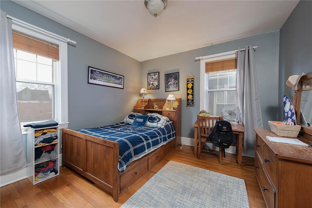 608 Blackburn Road Sewickley, PA 15143 - Photo 17 of 24 Two separate closets and wood floors highlight the third second-floor bedroom.