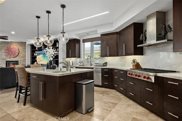 a bathroom with a granite countertop sink mirror vanity and toilet