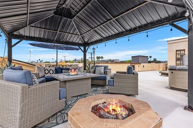 a front view of a residential apartment building with a yard