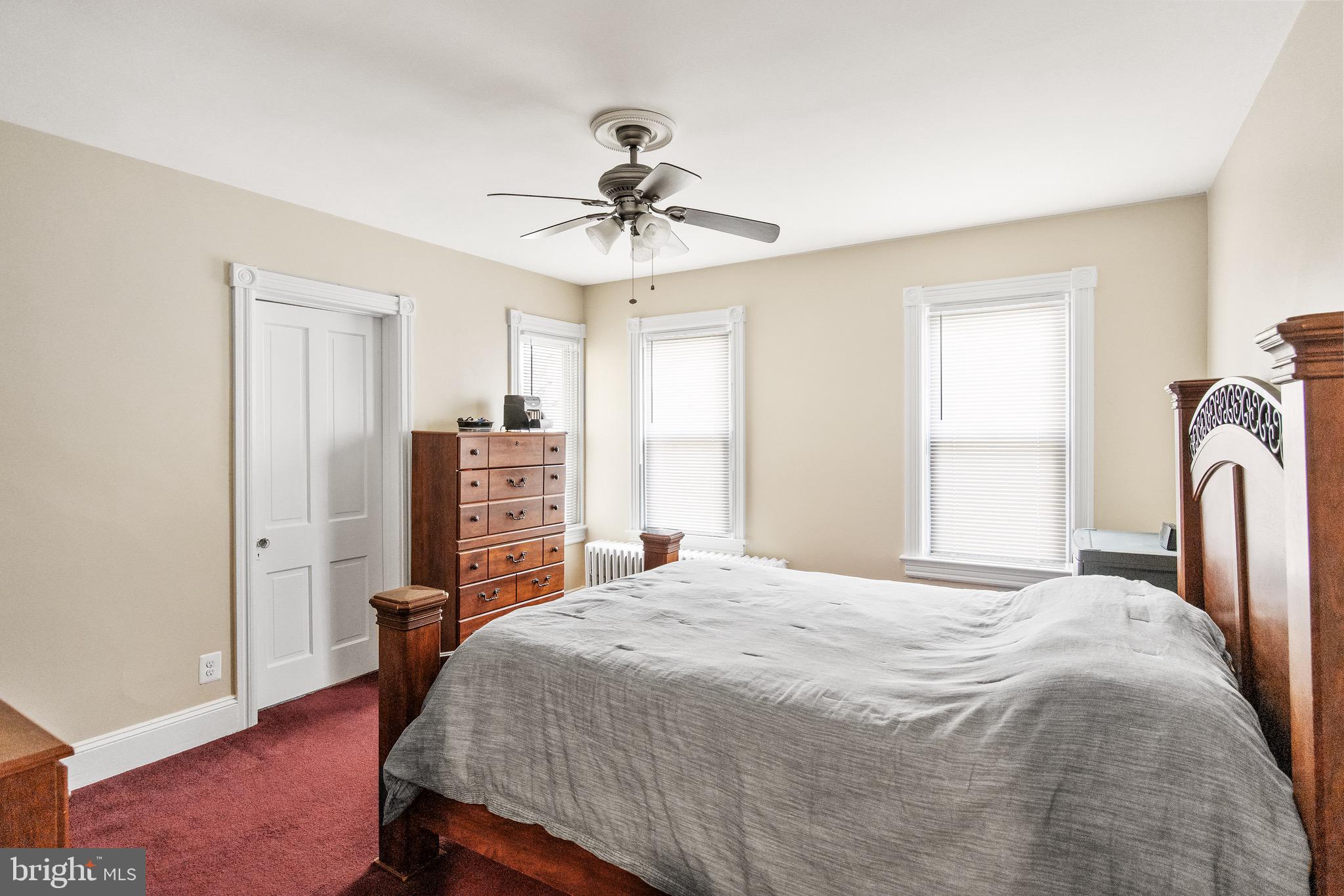 511 Ash Street Delanco, NJ 08075 - Photo 21 of 30 a bedroom with a bed dresser and a window