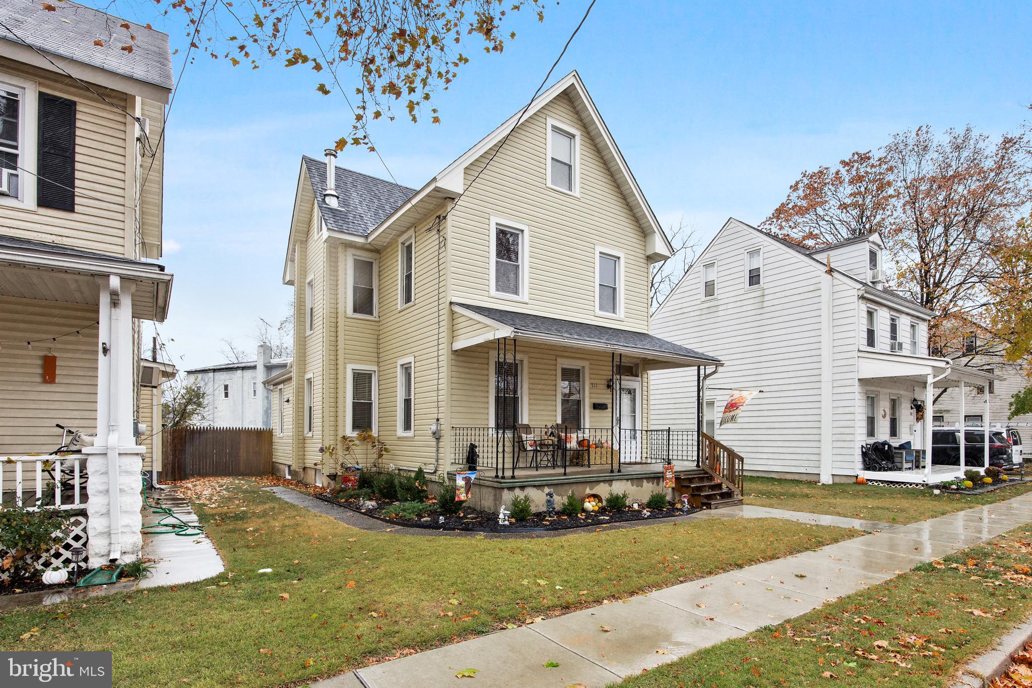 511 Ash Street Delanco, NJ 08075 - Photo 3 of 30 a view of a white house with a yard and plants