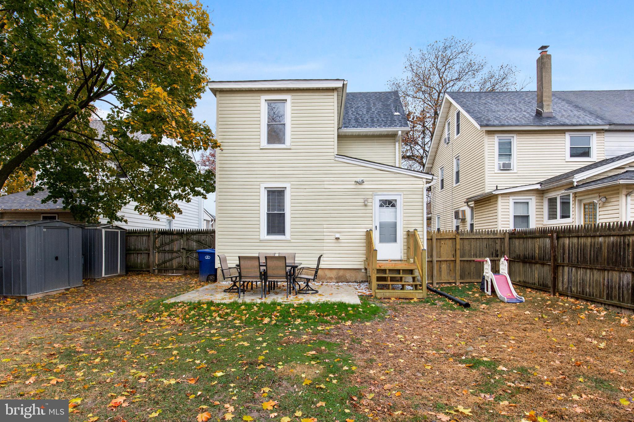 511 Ash Street Delanco, NJ 08075 - Photo 5 of 30 a view of a house with a yard and sitting area