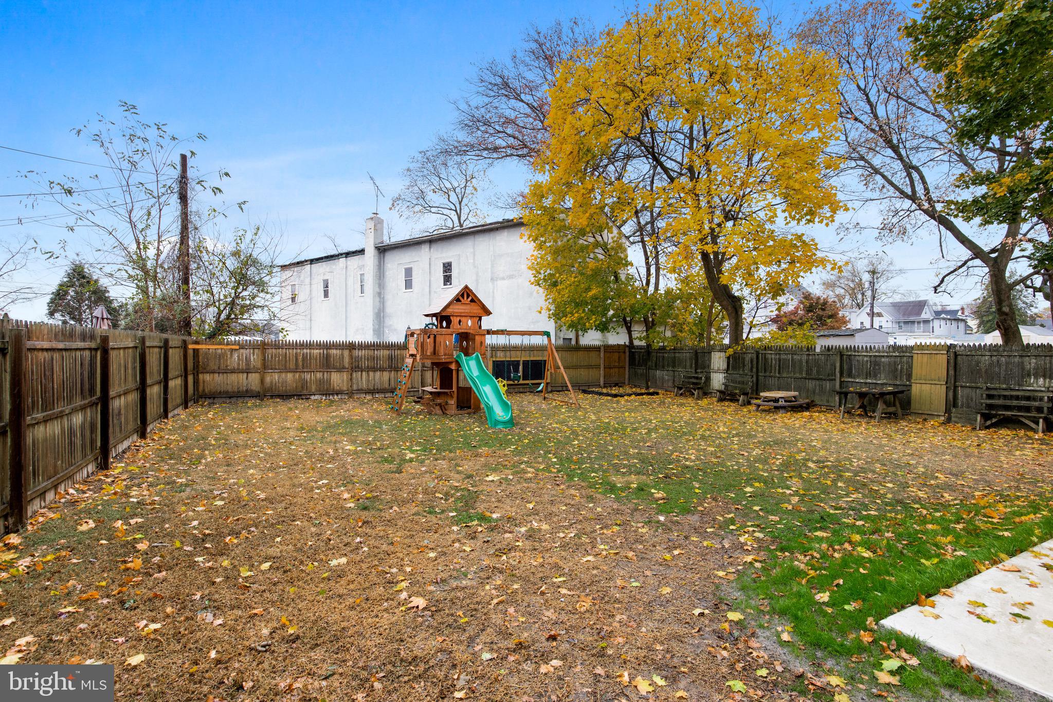 511 Ash Street Delanco, NJ 08075 - Photo 7 of 30 a view of backyard with wooden fence