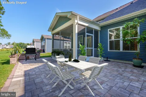 a view of a lounge chairs in patio