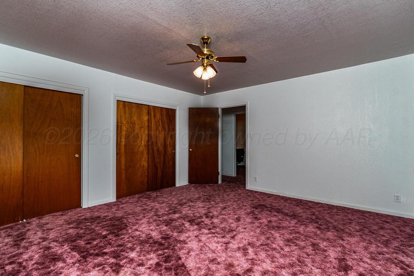 300 Mccarthy Street Borger, TX 79007 - Photo 15 of 31 a view of a livingroom with a chandelier fan and a window