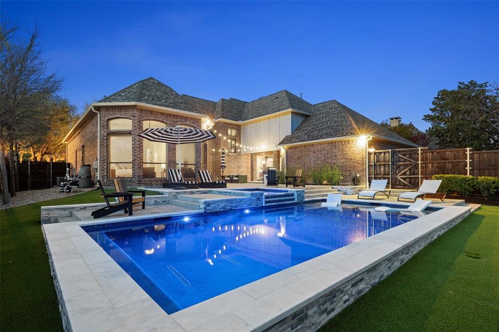 1715 San Jacinto Drive Allen, TX 75013 - Photo 1 of 33 a view of a house with swimming pool and sitting area