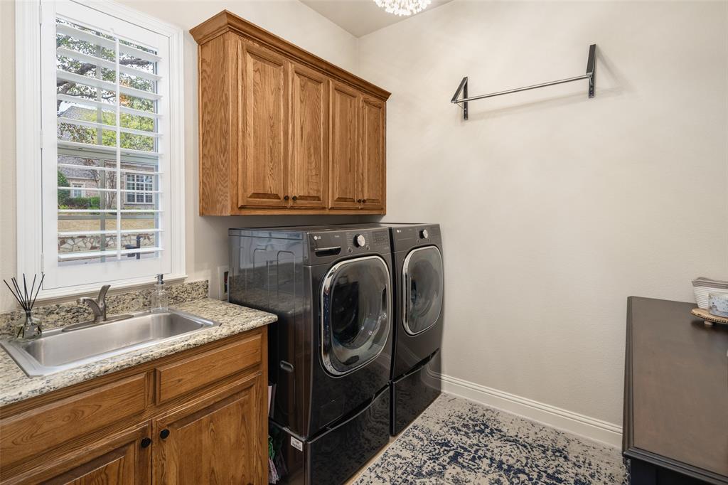 1715 San Jacinto Drive Allen, TX 75013 - Photo 13 of 33 a utility room with dryer and washer