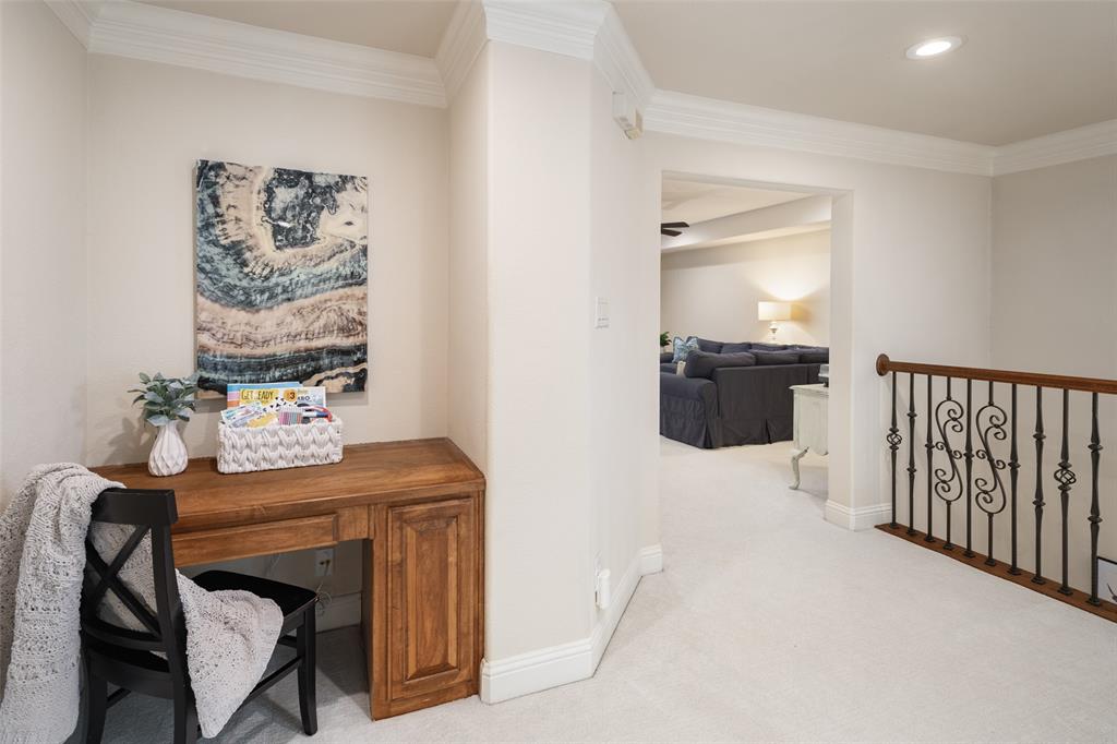 1715 San Jacinto Drive Allen, TX 75013 - Photo 19 of 33 a hallway with a stove a dining table and chairs