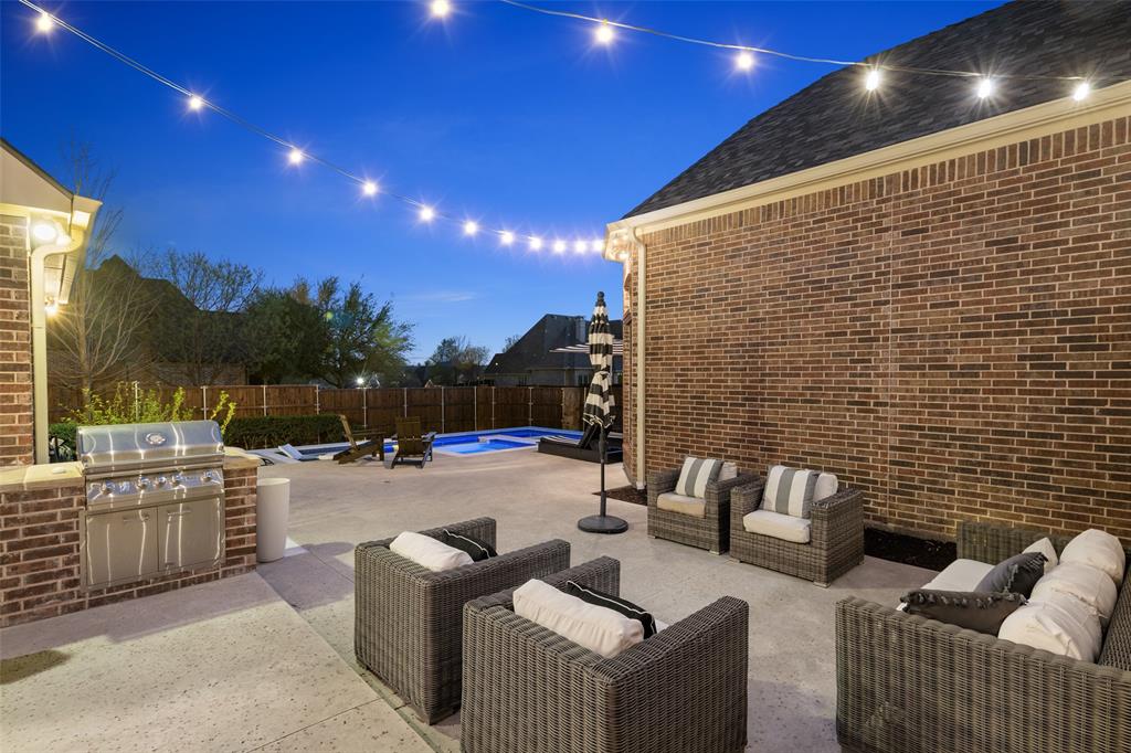 1715 San Jacinto Drive Allen, TX 75013 - Photo 21 of 33 a outdoor living space with patio furniture and a fireplace