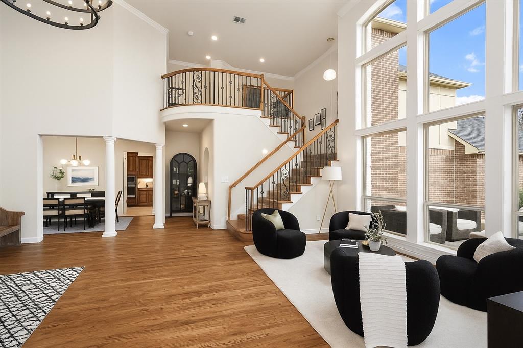 1715 San Jacinto Drive Allen, TX 75013 - Photo 3 of 33 a living room with furniture a fireplace and wooden floor