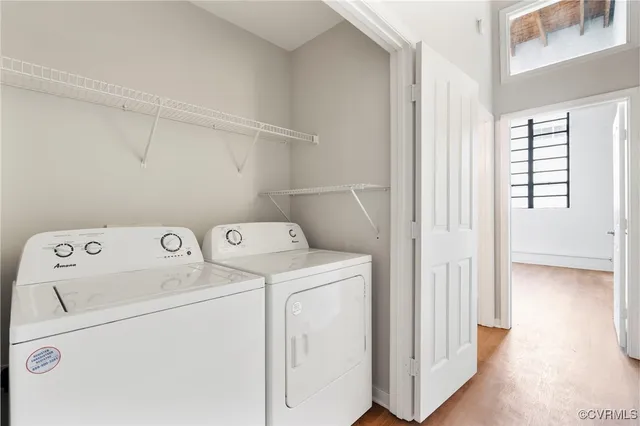a view of storage and utility room with washer and dryer