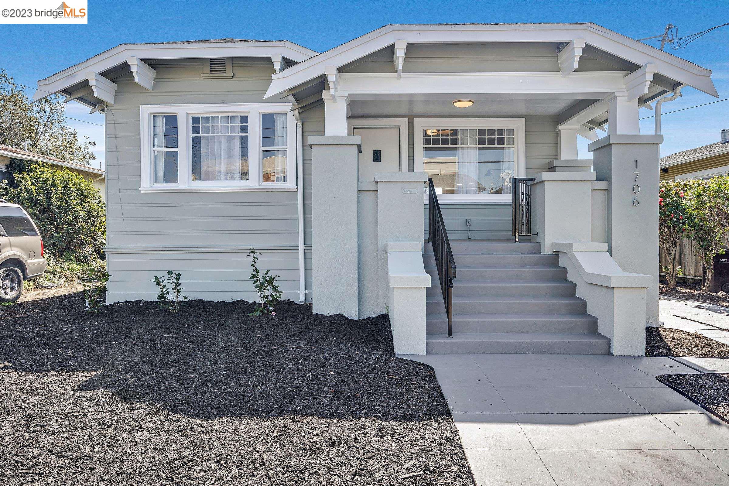 a front view of a house with wooden floor
