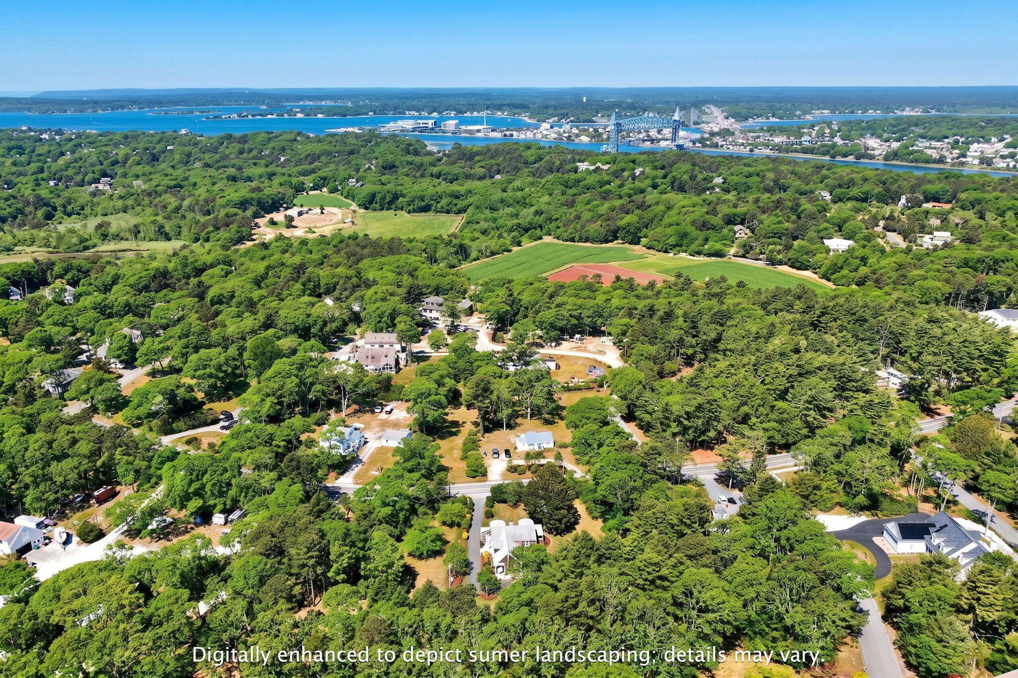 69 County Road Bourne, MA 02532 - Photo 3 of 54 view of a city with an outdoor space