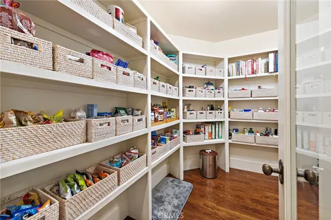a living room filled with furniture and a window