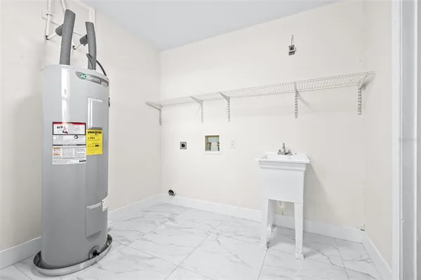 a bathroom with a sink vanity and mirror