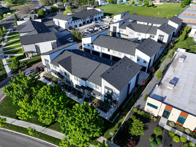 220 Spring Creek Parkway Providence, UT 84332 - Photo 14 of 17 Modern architectural townhome community featuring crisp white and black facades