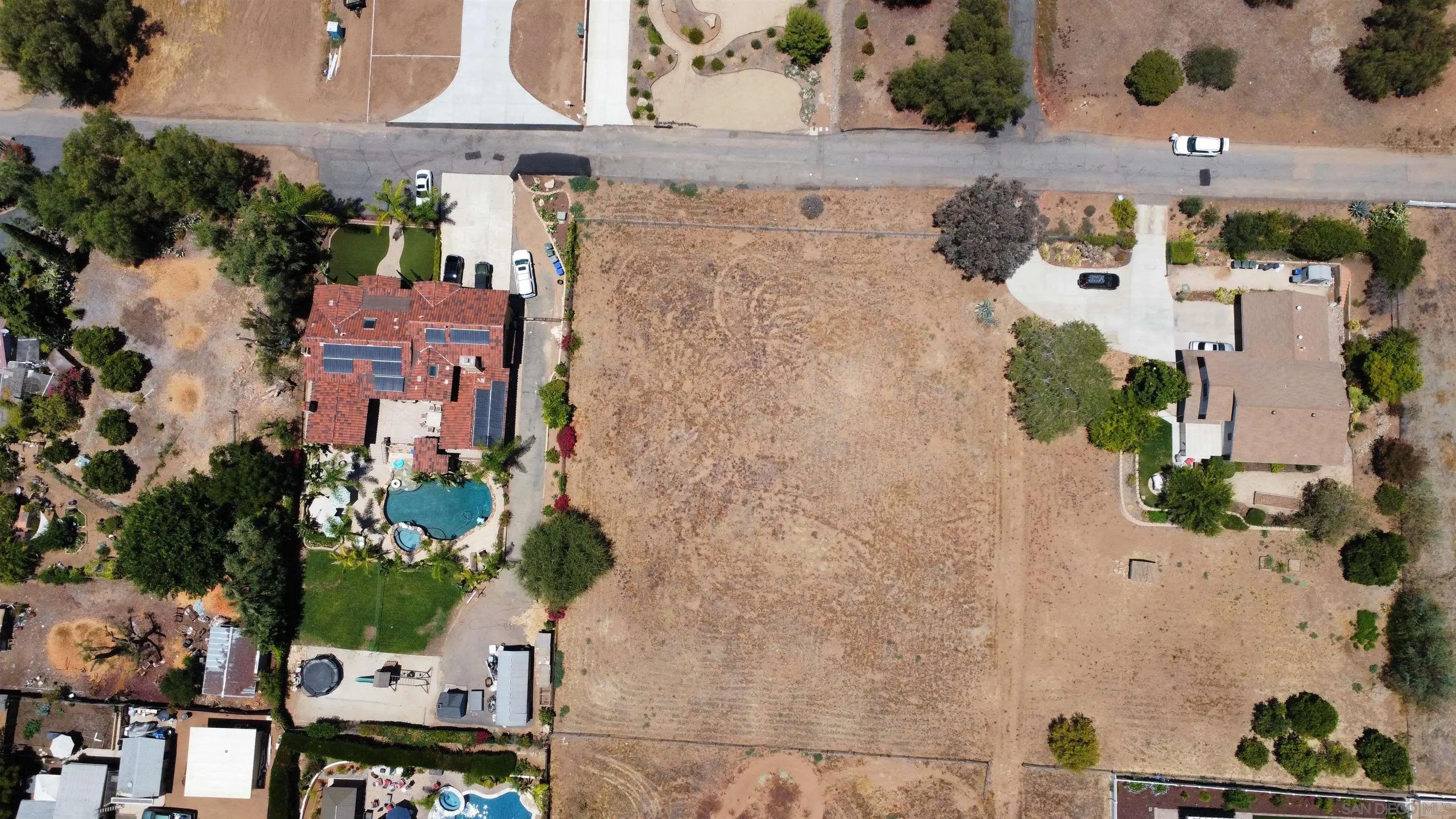 Canyon Drive Poway, CA 92064 - Photo 6 of 12 an aerial view of residential houses with outdoor space and parking