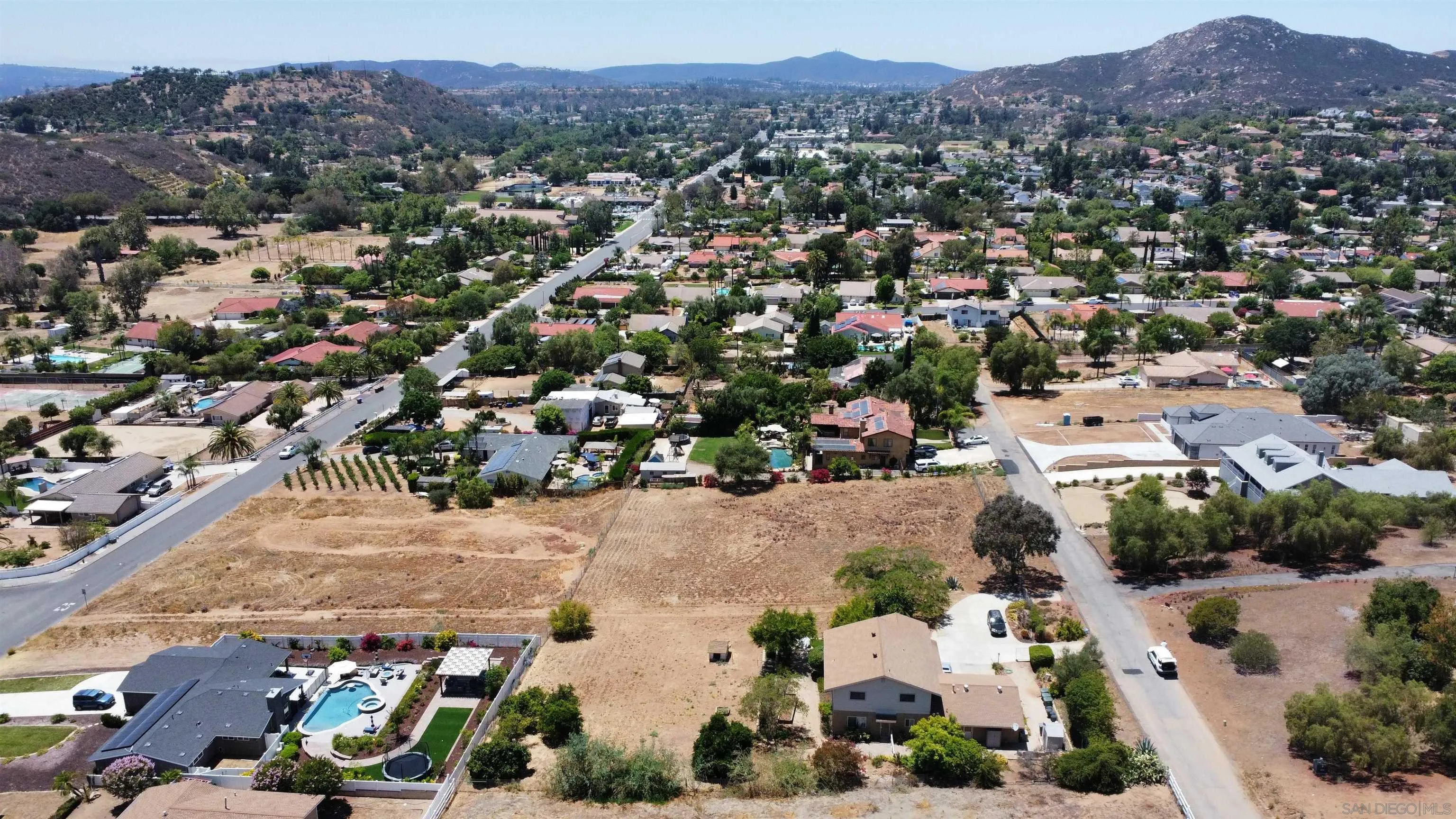 Canyon Drive Poway, CA 92064 - Photo 7 of 12 an aerial view of a city with lots of residential buildings