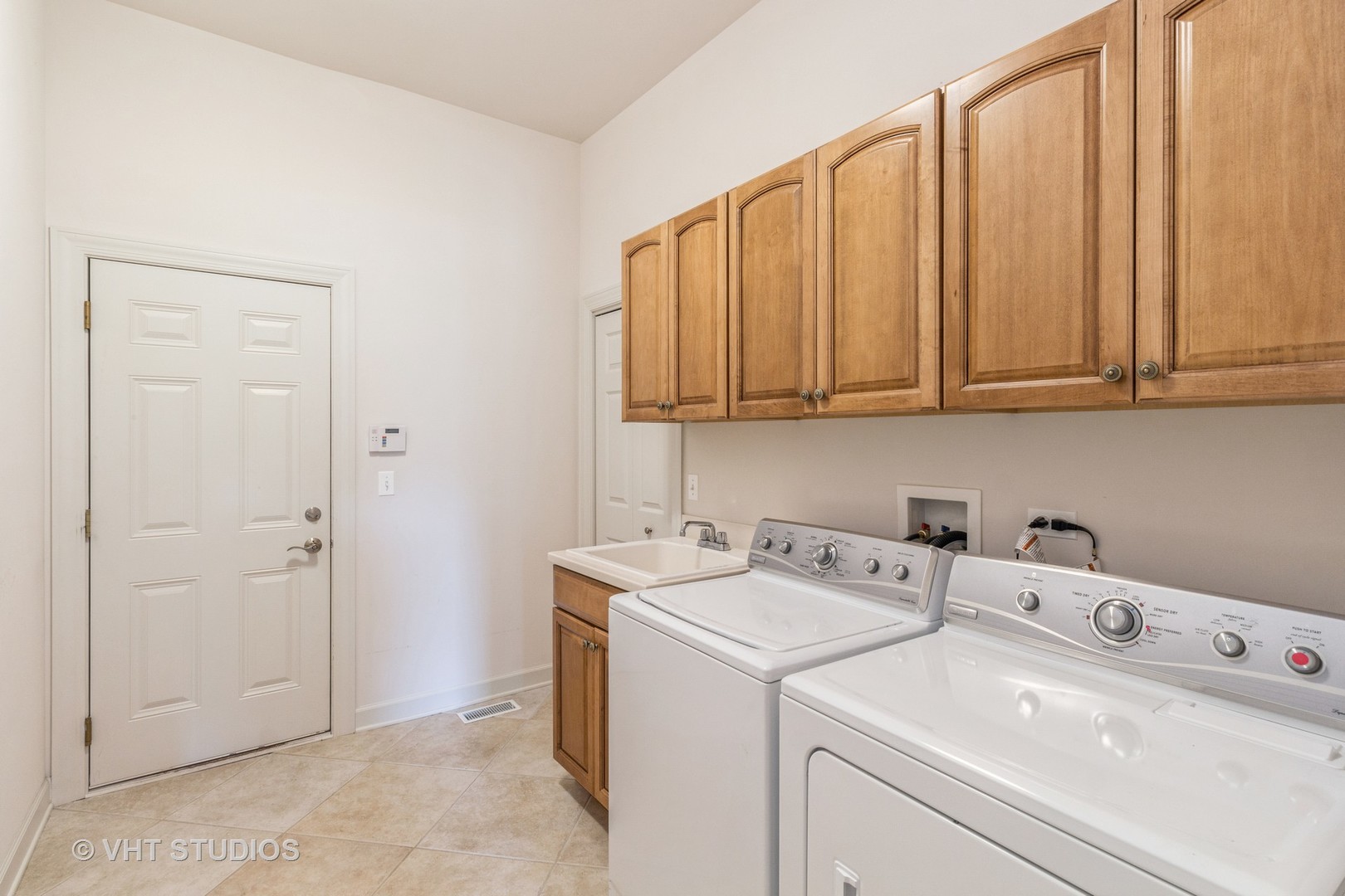 1 Sugar Maple Court Lake In The Hills, IL 60156 - Photo 12 of 29 a view of storage and utility room with washer and dryer